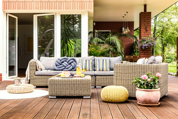 Beige garden furniture on terrace - obrazy, fototapety, plakaty
