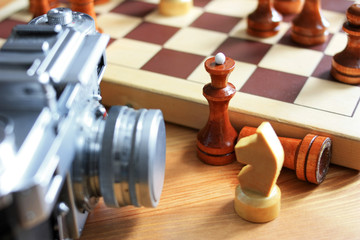 Film camera and chess pieces