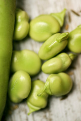 raw broad beans on a table