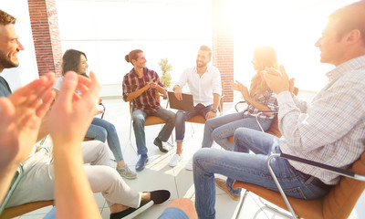 creative team applauding the speaker