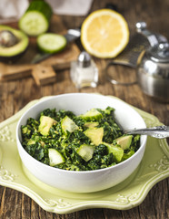 Chopped kale salad with avocado and cucumber
