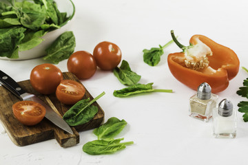 Fresh vegetables on white background.