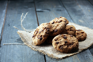 Chocolate cookies on wooden table. Chocolate chip cookies