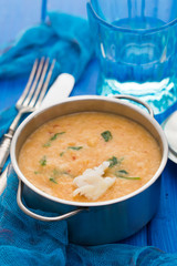 traditional portuguese dish bread with fish acorda on dish