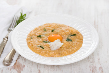 traditional portuguese dish bread with fish acorda on dish