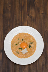 traditional portuguese dish bread with fish acorda on dish