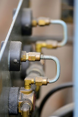 Hydraulics oil station on the machine tool on industrial equipment. Lubrication system with oil under pressure.