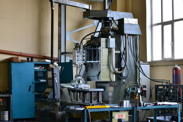 Spindle for the cone of the cutter in disassembled form. Repair of machine tools and equipment.