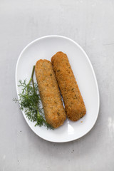 meat croquetes on white dish