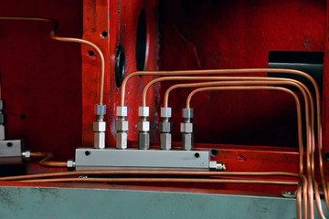 Hydraulics oil station on the machine tool on industrial equipment. Lubrication system with oil...