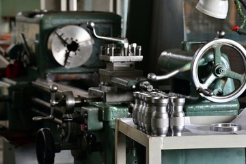 Metal part with a notch after turning on a rack near the machine