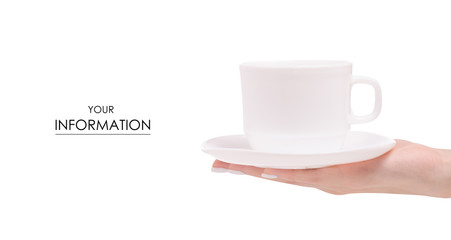 White cup and saucer in female hands pattern