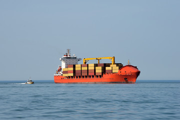 International container cargo ship in open sea
