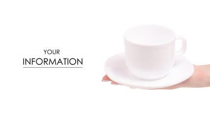 White cup and saucer in female hands pattern