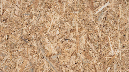 texture of a wooden plate from compressed shavings