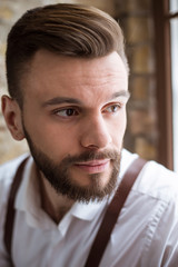 Fototapeta premium Happy portrait of smiling handsome bearded man in white shirt with very good mood.