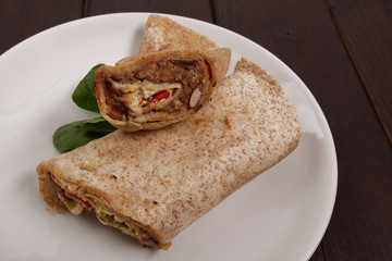 Tasty vegetarian tortillas on a table