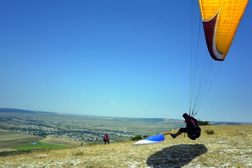 The paraglider is landing
