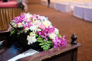 Close up flower bouquet on wooden podium