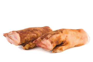 Two raw pig trotters