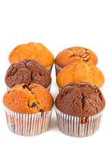 Fresh muffins with jam,raisins and chocolate