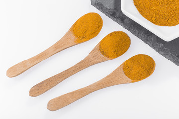 turmeric powder in container - curcuma longa