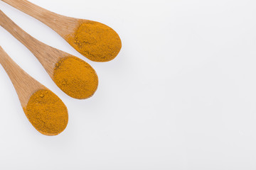 turmeric powder in container - curcuma longa