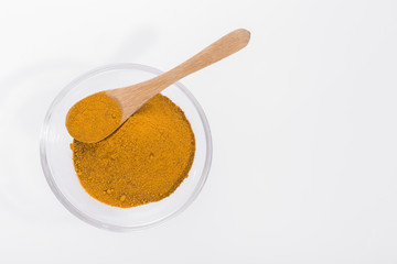 turmeric powder in container - curcuma longa