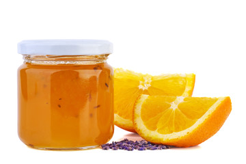 Fototapeta na wymiar Orange jam, slices and dried lavender herb