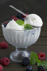 Ice cream balls in a glass vase.
