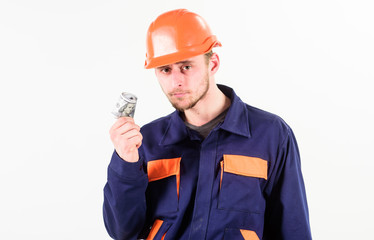 Construction worker making money or being paid on white background.