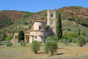 Fototapeta premium Medieval Abbey of San Antimo on a sunny day. Tuscany, Italy