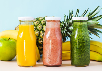 Colorful smoothies in bottles. Natural Organic Food Style.