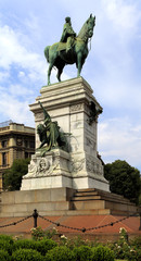 Obraz premium Italy, Milan historic quarter - via Dante street - Largo Cairoli roundabout and Giuseppe Garibaldi monument