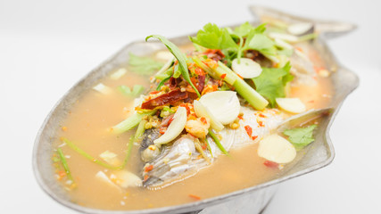 Steamed snapper with lemon sauce.