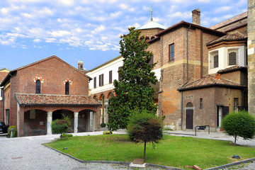 Milan, Italy - External view of the Basilica of Sant’Ambrogio by the Piazza Sant’Ambrogio square