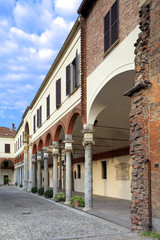 Milan, Italy - External view of the Basilica of Sant’Ambrogio by the Piazza Sant’Ambrogio square