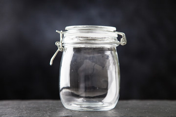 Glass jar on dark background
