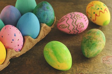 Colorful Handmade easter Eggs decorated by kids