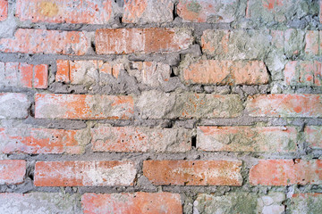 Old dirty wall brick wall made of red brick