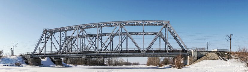 Railway bridge over the winter river
