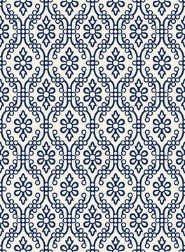 Indigo dye woodblock printed seamless ethnic floral damask pattern. Traditional oriental ornament of India Kashmir,  geometric flowers and ogee molding, navy blue on ecru background. Textile design.