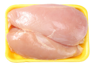 Raw chicken fillet isolated on white background. top view