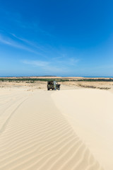 White sand dune in Mui Ne, Off road car, Vietnam, Travel