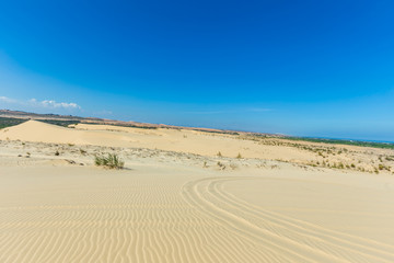 White sand dune in Mui Ne, Vietnam, Popular tourist attraction, Travel