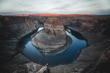 Famous rock formation of Horseshoe Bend with blue colorado river in Havasu area by Page, Arizona USA