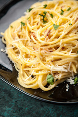 Spaghetti carbonara with egg and pancetta