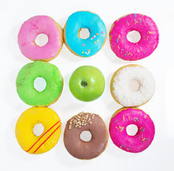 Colorful delicious donuts isolated on white background cutout