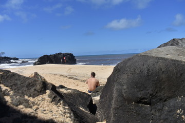 sitting on beach