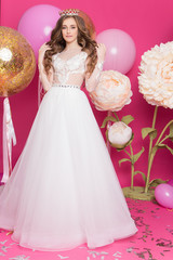 young teenage girl in the studio on a pink background. Like a princess © yuliachupina